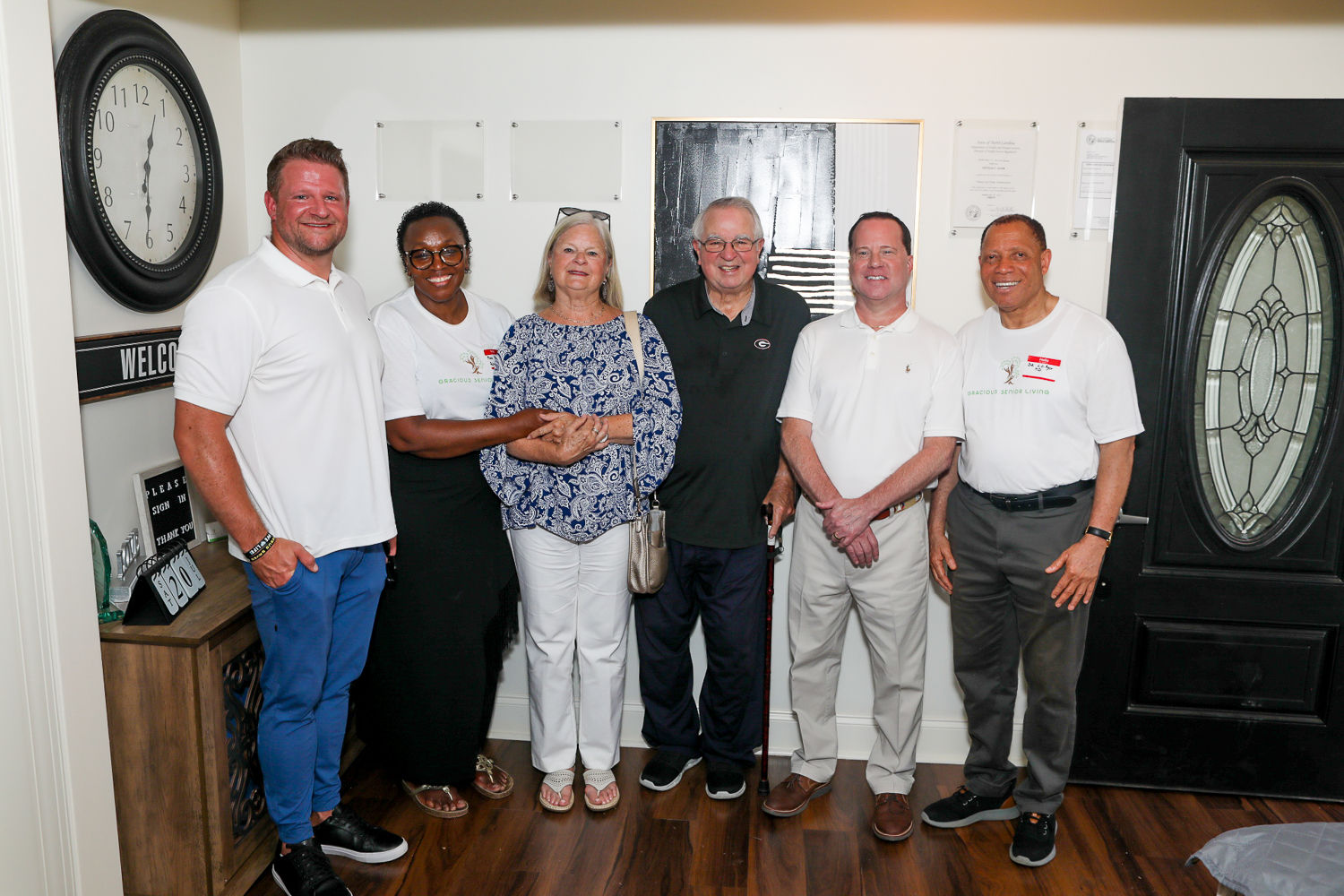 Friends, community partners and team members gathered inside Gracious Senior Living